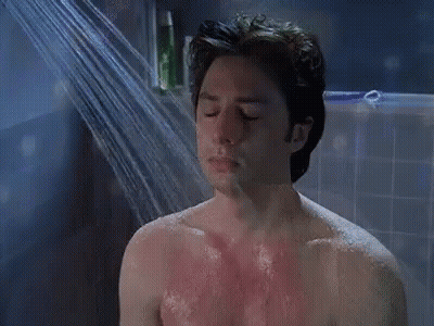 Man Taking Shower With Eyes Closed GIF