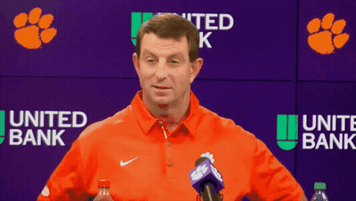 Man Talking In Front Of United Bank Sign GIF