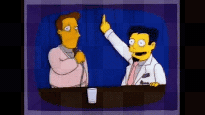 Man Talking Into Microphone Another Pointing GIF