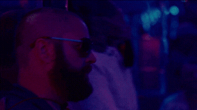 Man Talking Into Microphone, Another Says Helloooo? GIF