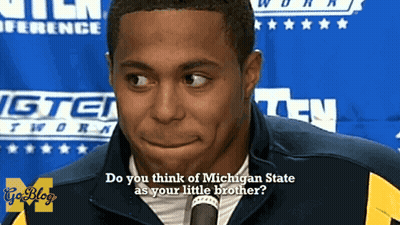 Man Talking Into Microphone Do You Think Of Michigan State As Your Little Brother GIF