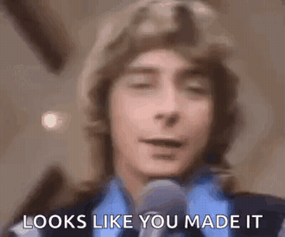 Man Talking Into Microphone Eyes Closed GIF