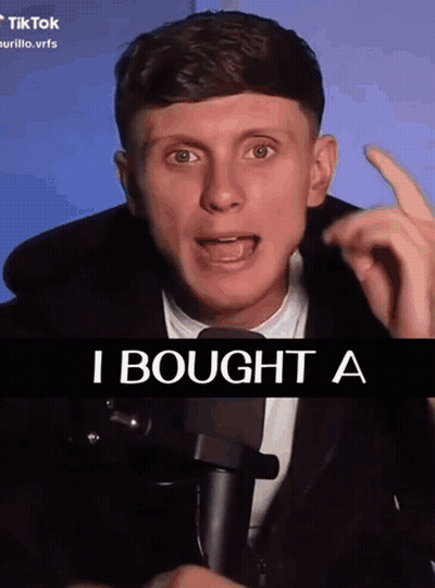 Man Talking Into Microphone Saying I Bought A GIF