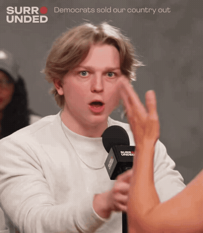Man Talking Into Microphone Saying Surrounded GIF