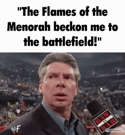 Man Talking Into Microphone Saying The Flames Of The Menorah Beckon Me To The Battlefield GIF