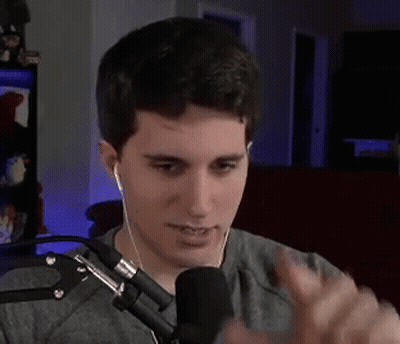 Man Talking Into Microphone With Headphones GIF