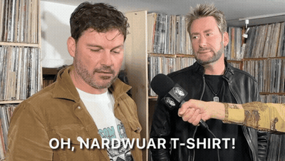 Man Talking Into Microphone With Oh Nardwuar T-Shirt GIF