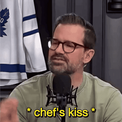 Man Talking Into Microphone With Yellow Chef's Kiss GIF