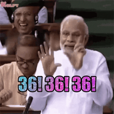Man Talking On Cell Phone At Microphone Another Laughs GIF