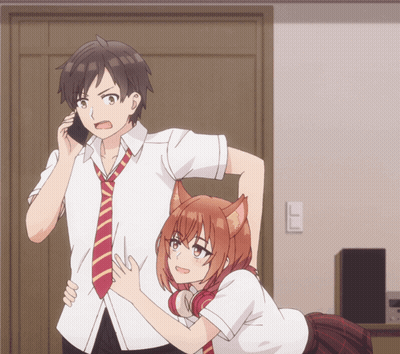 Man Talking On Cell Phone Beside Girl With Cat Ears GIF