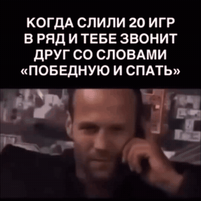 Man Talking On Cell Phone In Black Background GIF