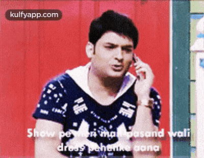 Man Talking On Cell Phone In Black Shirt GIF
