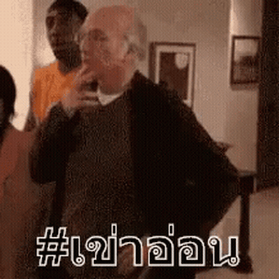 Man Talking On Cell Phone In Living Room GIF