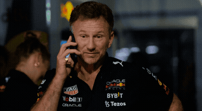 Man Talking On Cell Phone In Red Bull Racing Shirt GIF
