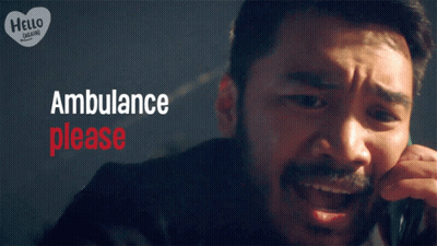 Man Talking On Cell Phone Saying Ambulance Please GIF