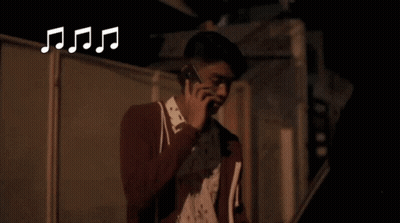 Man Talking On Cell Phone Saying Good Luck Brucie GIF