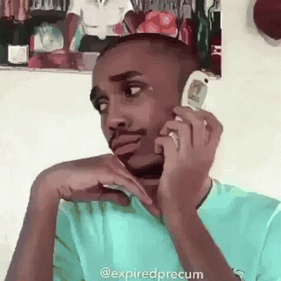 Man Talking On Cell Phone Sitting In Chair GIF
