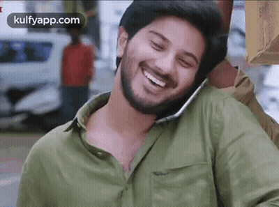 Man Talking On Cell Phone Smiling GIF
