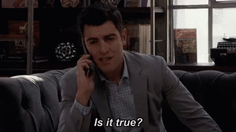 Man Talking On Cell Phone While Sitting On Couch GIF