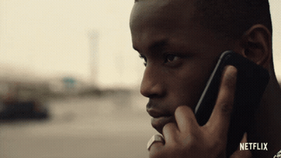 Man Talking On Cell Phone With Netflix GIF