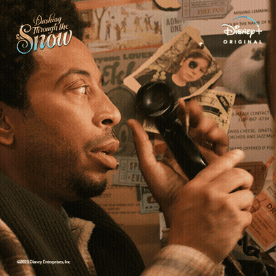 Man Talking On Phone Dash Through The Snow GIF