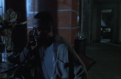 Man Talking On Phone In Dark GIF