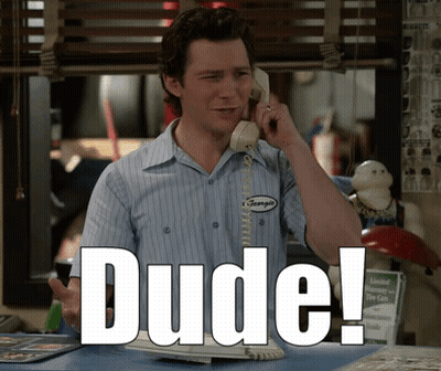 Man Talking On Phone With Dude Shirt GIF