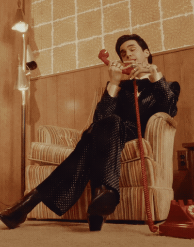 Man Talking On Red Phone GIF