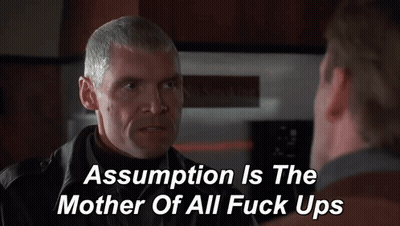 Man Talking To Another Man Assumption Is The Mother Of All Fuck Ups GIF
