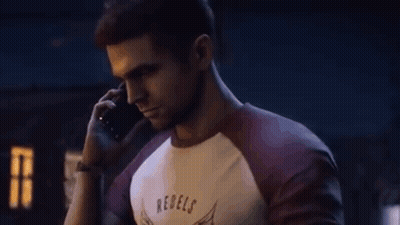 Man Talking To Another Man In Front Of Burning Building GIF
