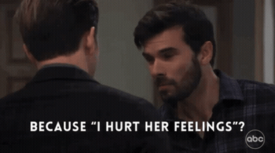 Man Talking To Another Man Saying Because I Hurt Her Feelings GIF