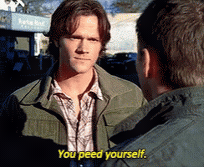 Man Talking To Another Man Saying You Peed Yourself GIF