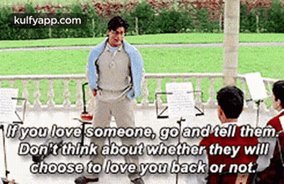 Man Talking To Group Of Young Boys GIF