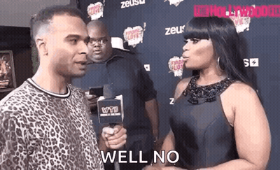 Man Talking To Woman Holding Microphone GIF