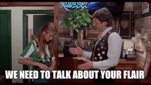 Man Talking To Woman In Room GIF
