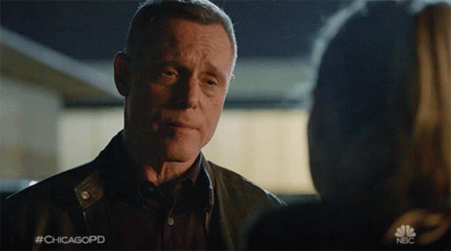 Man Talking To Woman With #Chicagopd GIF