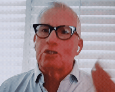 Man Talking With Glasses And Ear Buds GIF