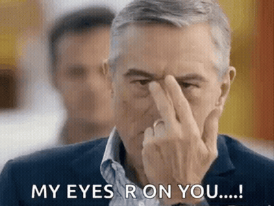 Man Tapping Forehead My Eyes Are On You GIF