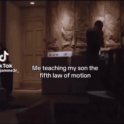 Man Teaching Son Fifth Law Of Motion In Dark Room GIF