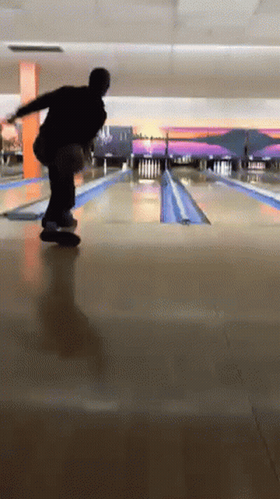 Man Throwing Bowling Ball GIF