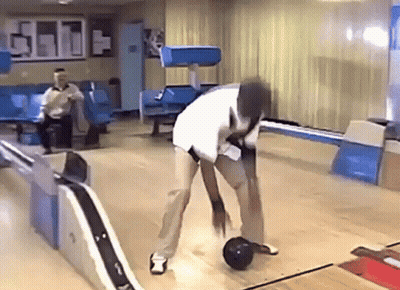 Man Throwing Bowling Ball On Bowling Alley GIF