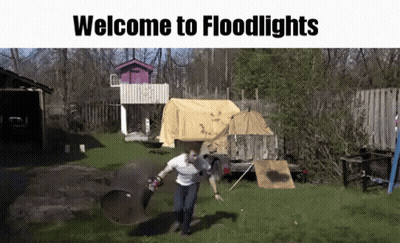 Man Throwing Object In Backyard Saying Welcome To Floodlights GIF