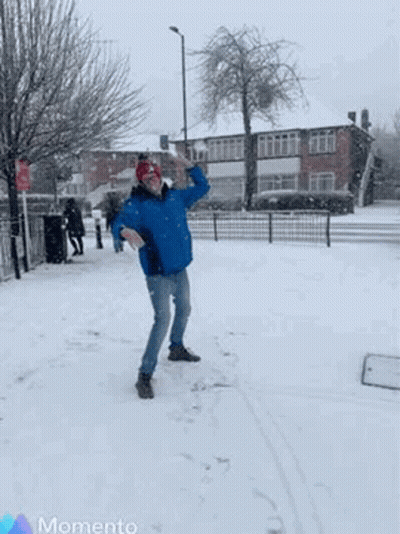 Man Throwing Snowball In Air GIF