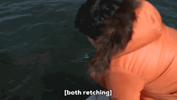 Man Throwing Up On Boat GIF