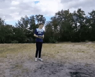Man Throws Frisbee Far GIF