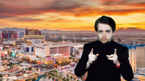Man Thumbs Up In Front Of City At Sunset GIF