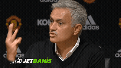 Man Thumbs Up In Front Of Jetbahis Sign GIF