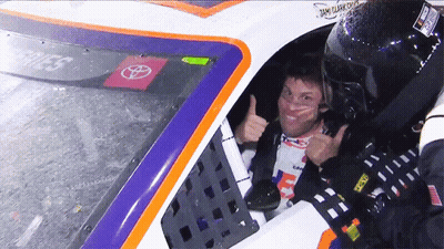Man Thumbs Up In Race Car GIF