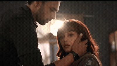 Man Touching Woman Face And Neck GIF