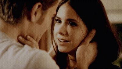 Man Touching Woman's Face GIF